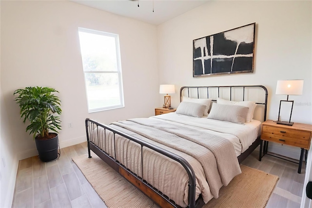 7 Hill Prince Dr, Ocala, FL 34482 - bedroom with multiple windows and light wood-style flooring