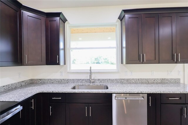 7 Hill Prince Dr, Ocala, FL 34482 - kitchen featuring stainless steel dishwasher, light stone counters, and stove