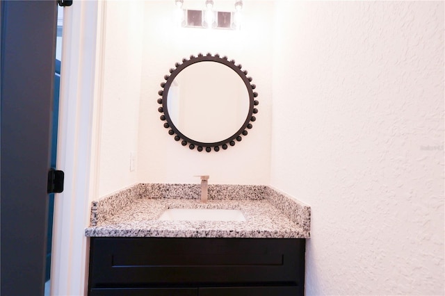 7 Hill Prince Dr, Ocala, FL 34482 - bathroom with vanity and a textured wall