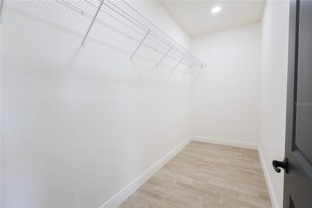 7 Hill Prince Dr, Ocala, FL 34482 - walk in closet featuring light wood-style floors