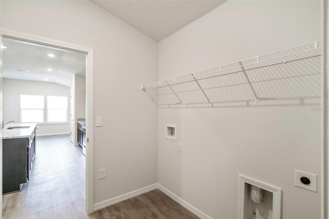 6865 SW 153 Place Rd, Ocala, FL 34473 - washroom with hookup for an electric dryer, hookup for a washing machine, and light wood finished floors