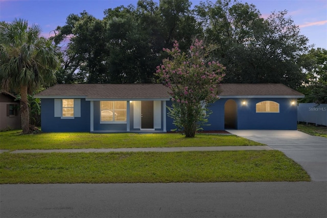 14761 SW 35th Terrace Rd, Ocala, FL 34473 - ranch-style home with a front lawn and concrete driveway