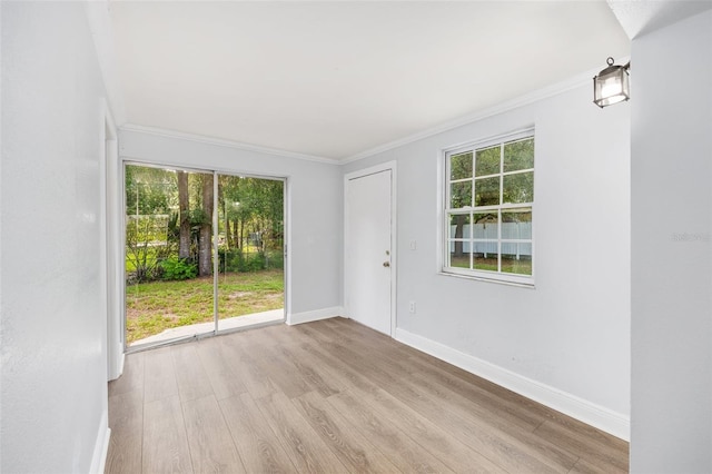 14761 SW 35th Terrace Rd, Ocala, FL 34473 - empty room with wood finished floors and crown molding
