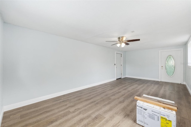 14761 SW 35th Terrace Rd, Ocala, FL 34473 - unfurnished living room with light wood finished floors and a ceiling fan