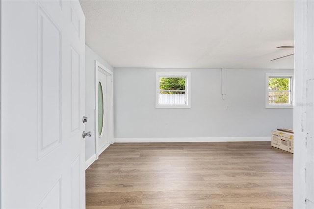 14761 SW 35th Terrace Rd, Ocala, FL 34473 - foyer entrance featuring wood finished floors and plenty of natural light