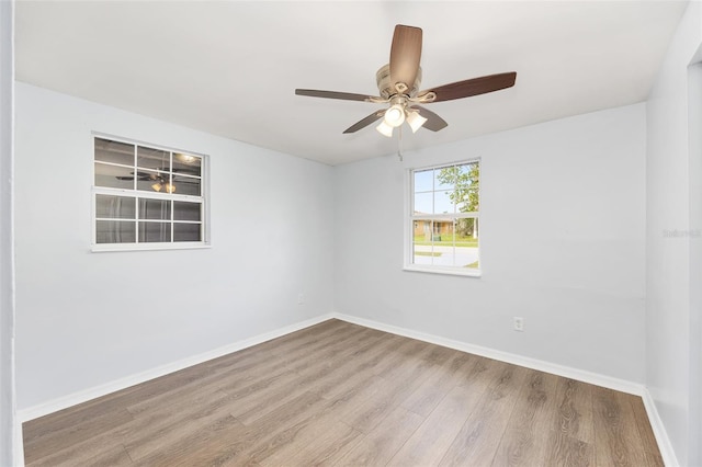 14761 SW 35th Terrace Rd, Ocala, FL 34473 - spare room with wood finished floors and a ceiling fan