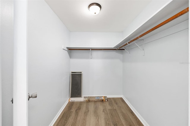 14761 SW 35th Terrace Rd, Ocala, FL 34473 - spacious closet featuring wood finished floors and a heating unit