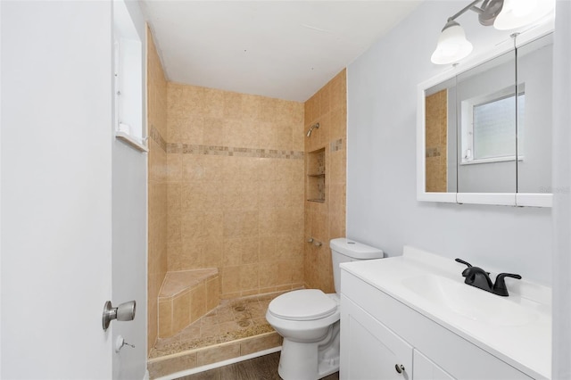14761 SW 35th Terrace Rd, Ocala, FL 34473 - full bathroom with vanity, a tile shower, and wood finished floors