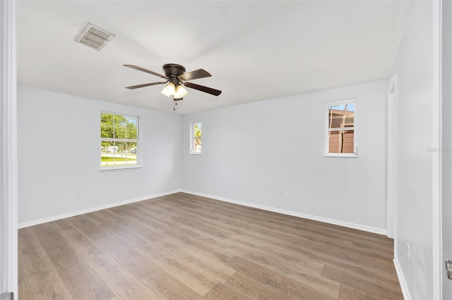 14761 SW 35th Terrace Rd, Ocala, FL 34473 - unfurnished room with a ceiling fan and wood finished floors