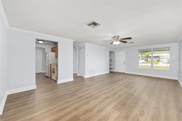 14761 SW 35th Terrace Rd, Ocala, FL 34473 - unfurnished living room with ceiling fan, crown molding, and light wood finished floors
