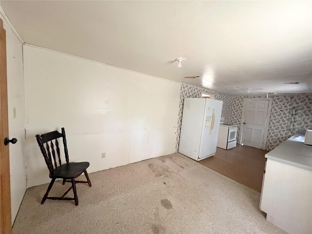 23161 NE 155th Ct, Fort Mc Coy, FL 32134 - unfurnished room with wallpapered walls and carpet floors