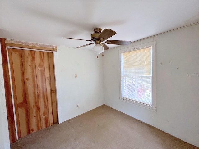 23161 NE 155th Ct, Fort Mc Coy, FL 32134 - unfurnished bedroom with light carpet and ceiling fan