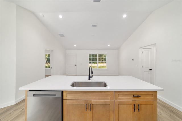 5400 NW 9th St, Ocala, FL 34482 - kitchen with dishwasher, lofted ceiling, light wood finished floors, light countertops, and a center island with sink