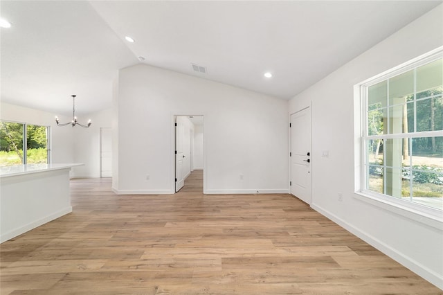 5400 NW 9th St, Ocala, FL 34482 - unfurnished room featuring a chandelier, lofted ceiling, recessed lighting, and light wood-type flooring