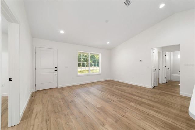 5400 NW 9th St, Ocala, FL 34482 - spare room with lofted ceiling, light wood-style floors, and recessed lighting