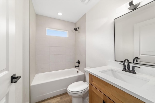 5400 NW 9th St, Ocala, FL 34482 - bathroom with vanity,  shower combination, and wood finished floors