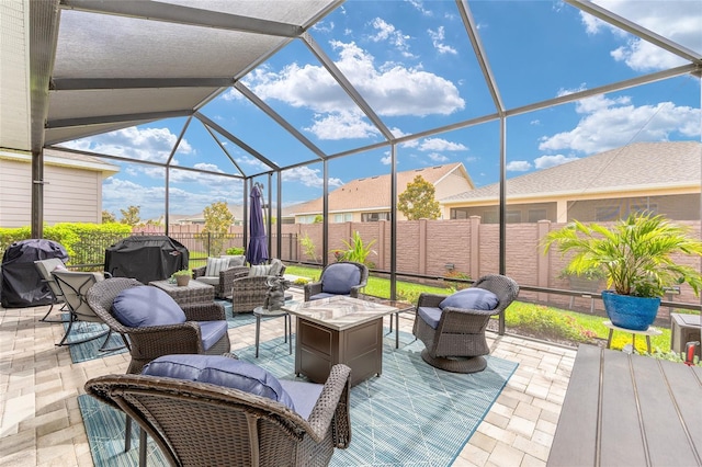 4340 NW 56th Ct, Ocala, FL 34482 - fenced backyard featuring an outdoor hangout area, a patio, a lanai, and area for grilling