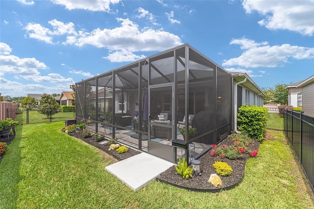 4340 NW 56th Ct, Ocala, FL 34482 - rear view of house with a fenced backyard, a patio, and a lanai