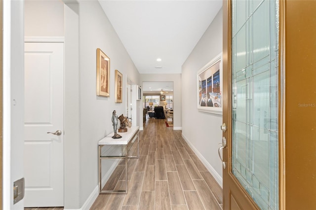 4340 NW 56th Ct, Ocala, FL 34482 - hallway featuring light wood-type flooring and baseboards