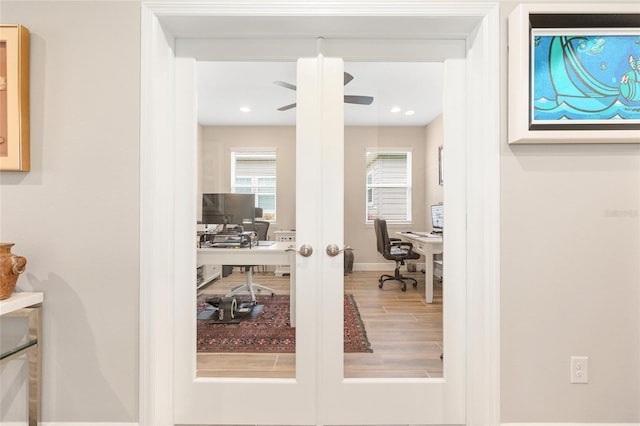 4340 NW 56th Ct, Ocala, FL 34482 - office area with french doors, a ceiling fan, and wood finished floors