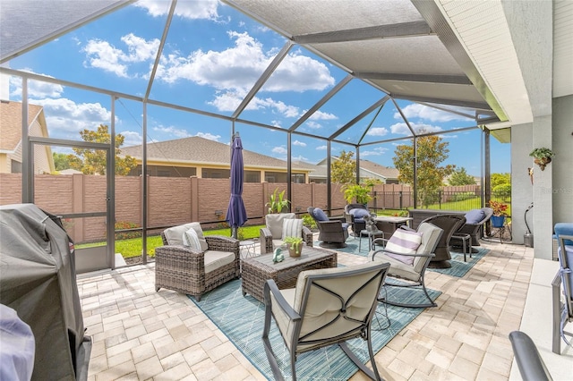 4340 NW 56th Ct, Ocala, FL 34482 - fenced backyard with outdoor lounge area, a patio area, and glass enclosure