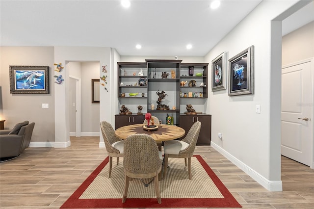 4340 NW 56th Ct, Ocala, FL 34482 - dining area featuring light wood-style flooring and recessed lighting