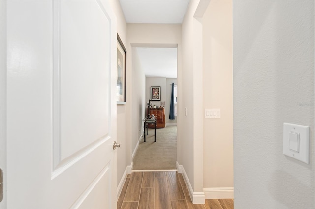 4340 NW 56th Ct, Ocala, FL 34482 - hall with wood finished floors and baseboards