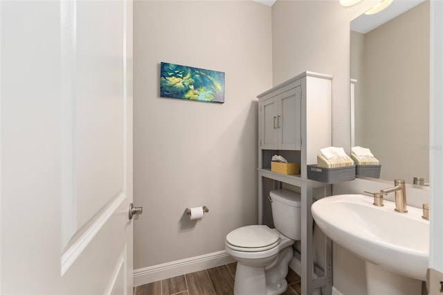 4340 NW 56th Ct, Ocala, FL 34482 - bathroom with toilet and wood finished floors