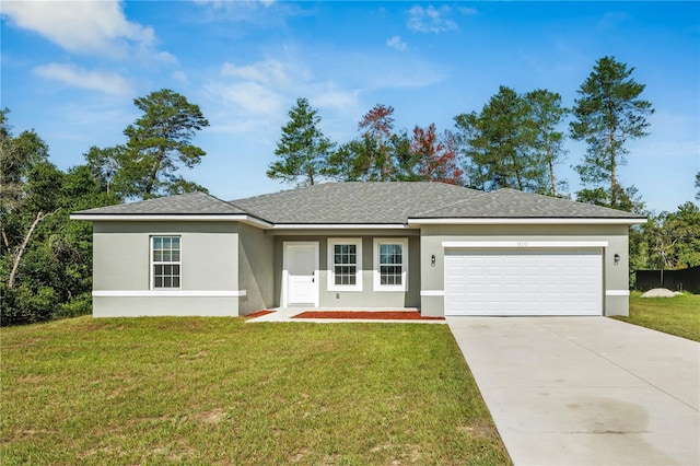 15212 SW 27th Ct, Ocala, FL 34473 - view of front facade with a garage, stucco siding, driveway, and a front lawn