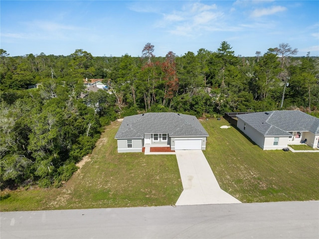 15212 SW 27th Ct, Ocala, FL 34473 - view of subject property with a heavily wooded area