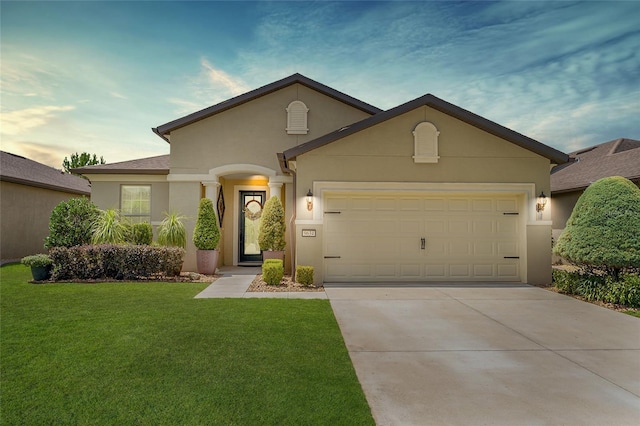 9634 SW 67th St, Ocala, FL 34481 - view of front of home with stucco siding, a front yard, concrete driveway, and an attached garage