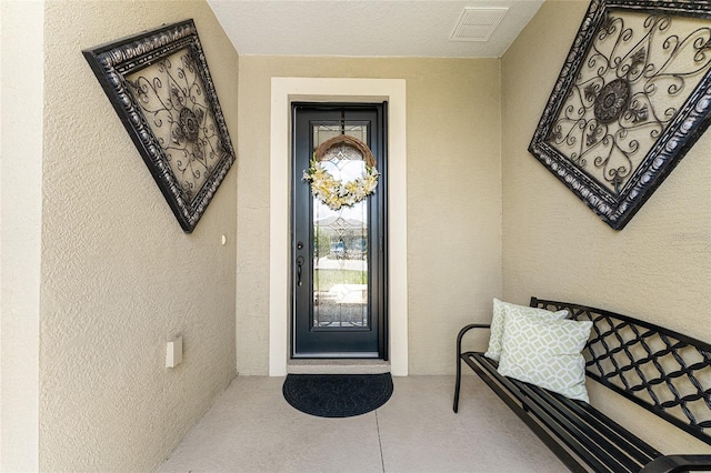 9634 SW 67th St, Ocala, FL 34481 - view of exterior entry with stucco siding