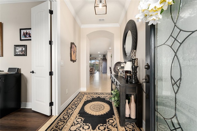 9634 SW 67th St, Ocala, FL 34481 - hallway featuring arched walkways, crown molding, and wood finished floors