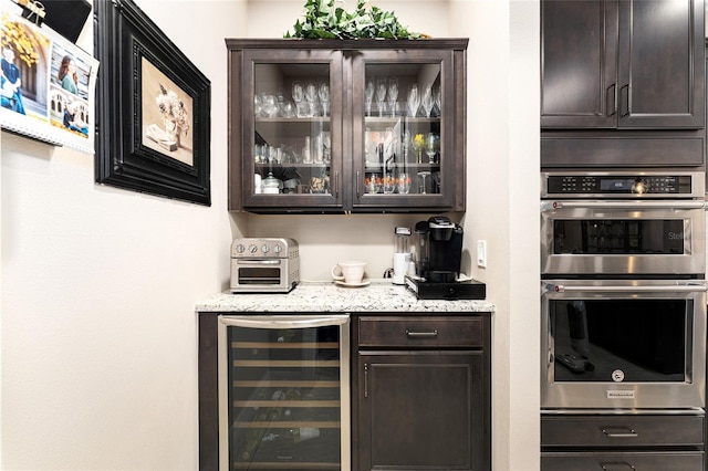 9634 SW 67th St, Ocala, FL 34481 - bar area featuring beverage cooler and stainless steel double oven