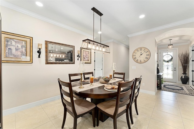 9634 SW 67th St, Ocala, FL 34481 - dining area with arched walkways, crown molding, light tile patterned floors, and recessed lighting