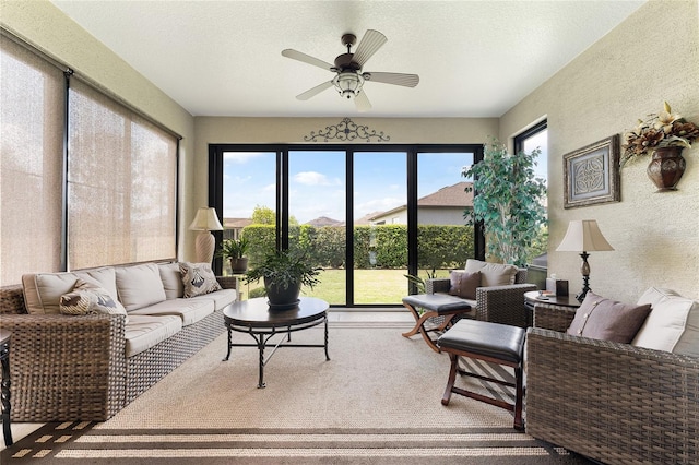 9634 SW 67th St, Ocala, FL 34481 - living room with ceiling fan, a textured wall, and a textured ceiling