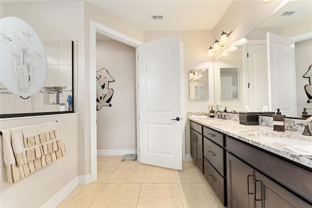 9634 SW 67th St, Ocala, FL 34481 - bathroom featuring double vanity and baseboards