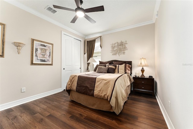 9634 SW 67th St, Ocala, FL 34481 - bedroom with dark wood-style flooring, crown molding, a closet, and ceiling fan