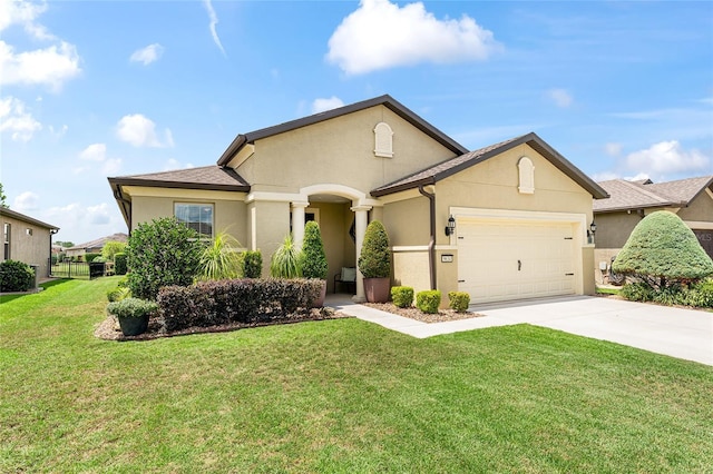 9634 SW 67th St, Ocala, FL 34481 - view of front of property featuring stucco siding, concrete driveway, an attached garage, and a front yard