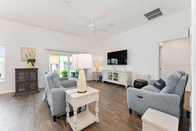 4416 Homan Loop, The Villages, FL 32163 - living room with a ceiling fan and dark wood-type flooring