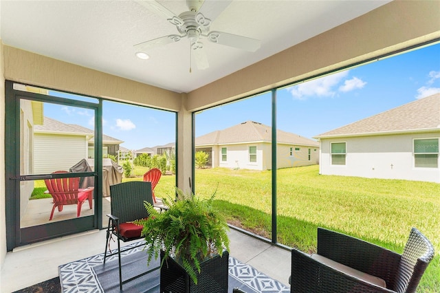 4416 Homan Loop, The Villages, FL 32163 - sunroom / solarium with ceiling fan and a residential view