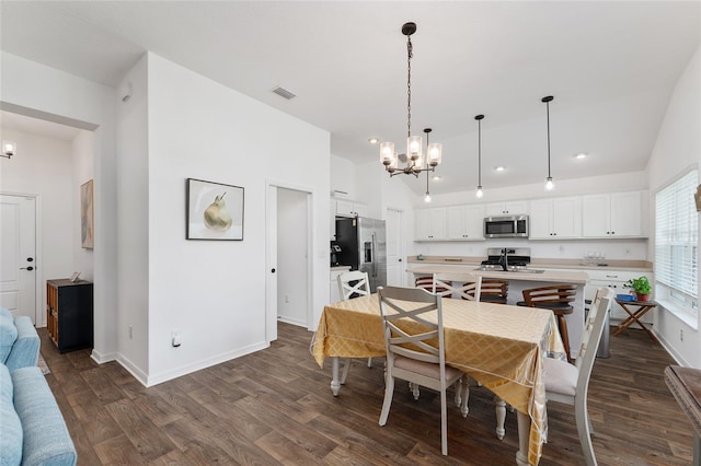 4416 Homan Loop, The Villages, FL 32163 - dining room with a chandelier, dark wood-style floors, and recessed lighting