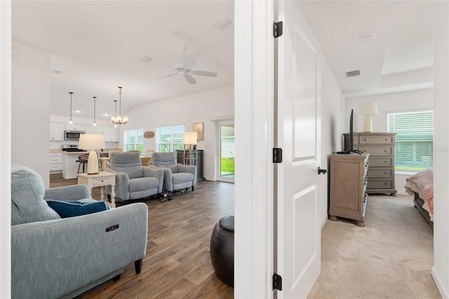 4416 Homan Loop, The Villages, FL 32163 - living room with healthy amount of natural light, ceiling fan, light wood-style flooring, and a desk