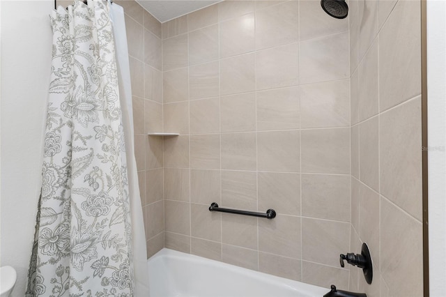 4416 Homan Loop, The Villages, FL 32163 - bathroom featuring shower / bath combo with shower curtain