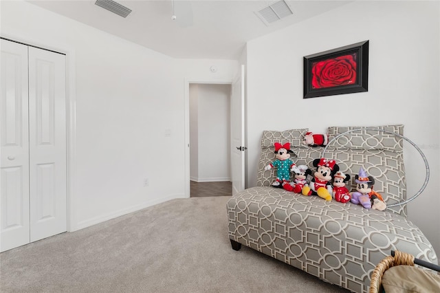 4416 Homan Loop, The Villages, FL 32163 - carpeted bedroom with a closet and ceiling fan