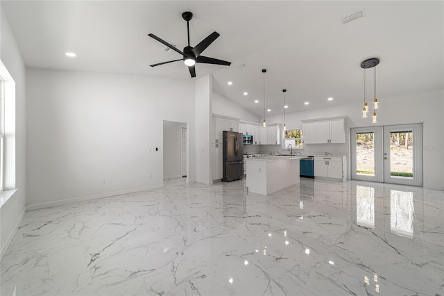 13741 SW 81st Cir, Ocala, FL 34473 - kitchen featuring dishwasher, open floor plan, a kitchen island, white cabinetry, and recessed lighting