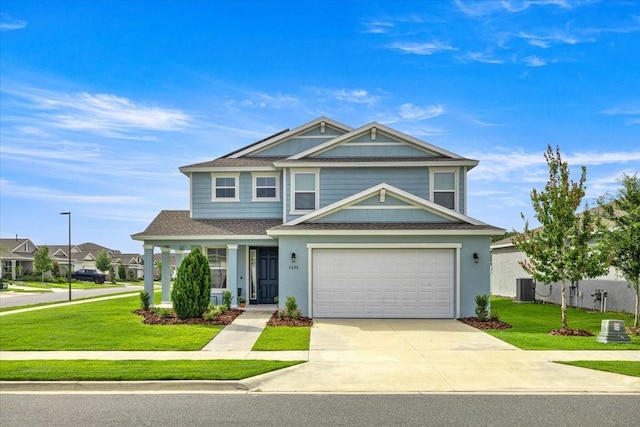 7695 SW 64th Street Rd, Ocala, FL 34474 - view of front of house with a shingled roof, a front yard, driveway, a porch, and a garage