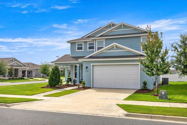 7695 SW 64th Street Rd, Ocala, FL 34474 - view of front facade featuring a front lawn, concrete driveway, and a shingled roof