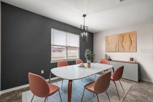 7695 SW 64th Street Rd, Ocala, FL 34474 - dining space with a chandelier and a textured ceiling