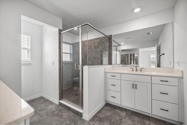 7695 SW 64th Street Rd, Ocala, FL 34474 - bathroom with vanity, a shower stall, tile patterned flooring, and recessed lighting